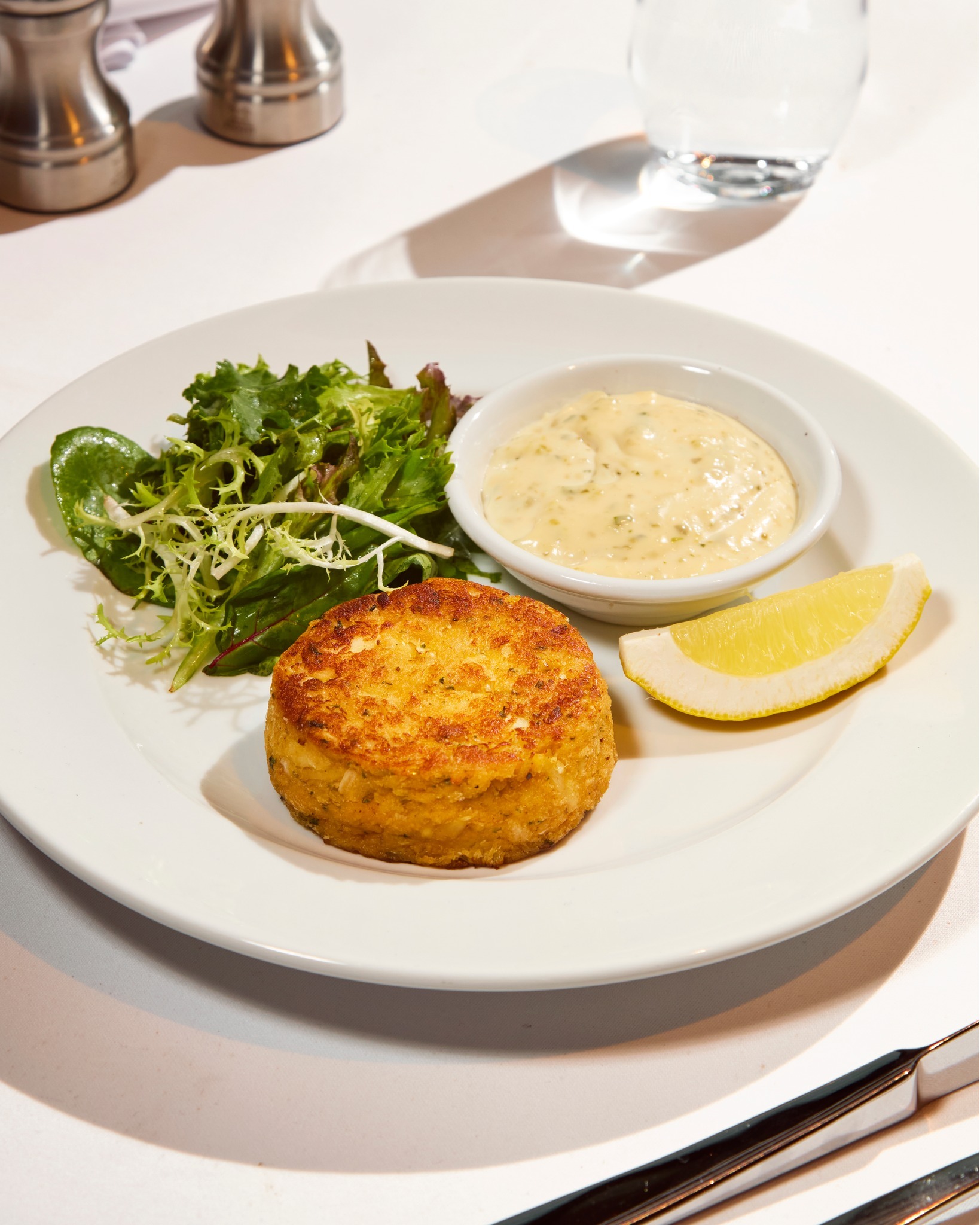 The Starter of Distinction: Wolfgang's Crab Cake.
​
We believe in minimal filler and maximum flavor. Our Crab Cake is defined by generous portions of sweet, premium crab meat, lightly seasoned and perfectly seared for a golden crust. It's an exquisite first course that speaks to uncompromising quality and freshness.
​
Start your next feast with this signature appetizer.
​
𝐑𝐞𝐬𝐞𝐫𝐯𝐚𝐭𝐢𝐨𝐧:
064-567-2929
LINE ID: wg.reservation
reservation@wolfgangssteakhouse.th
​
𝐖𝐨𝐥𝐟𝐠𝐚𝐧𝐠'𝐬 𝐒𝐭𝐞𝐚𝐤𝐡𝐨𝐮𝐬𝐞 𝐁𝐚𝐧𝐠𝐤𝐨𝐤
Mon - Sun: 11:30 AM - 11:30 PM
3rd floor, The Storeys at One Bangkok
​
#WolfgangsSteakhouseThailand
