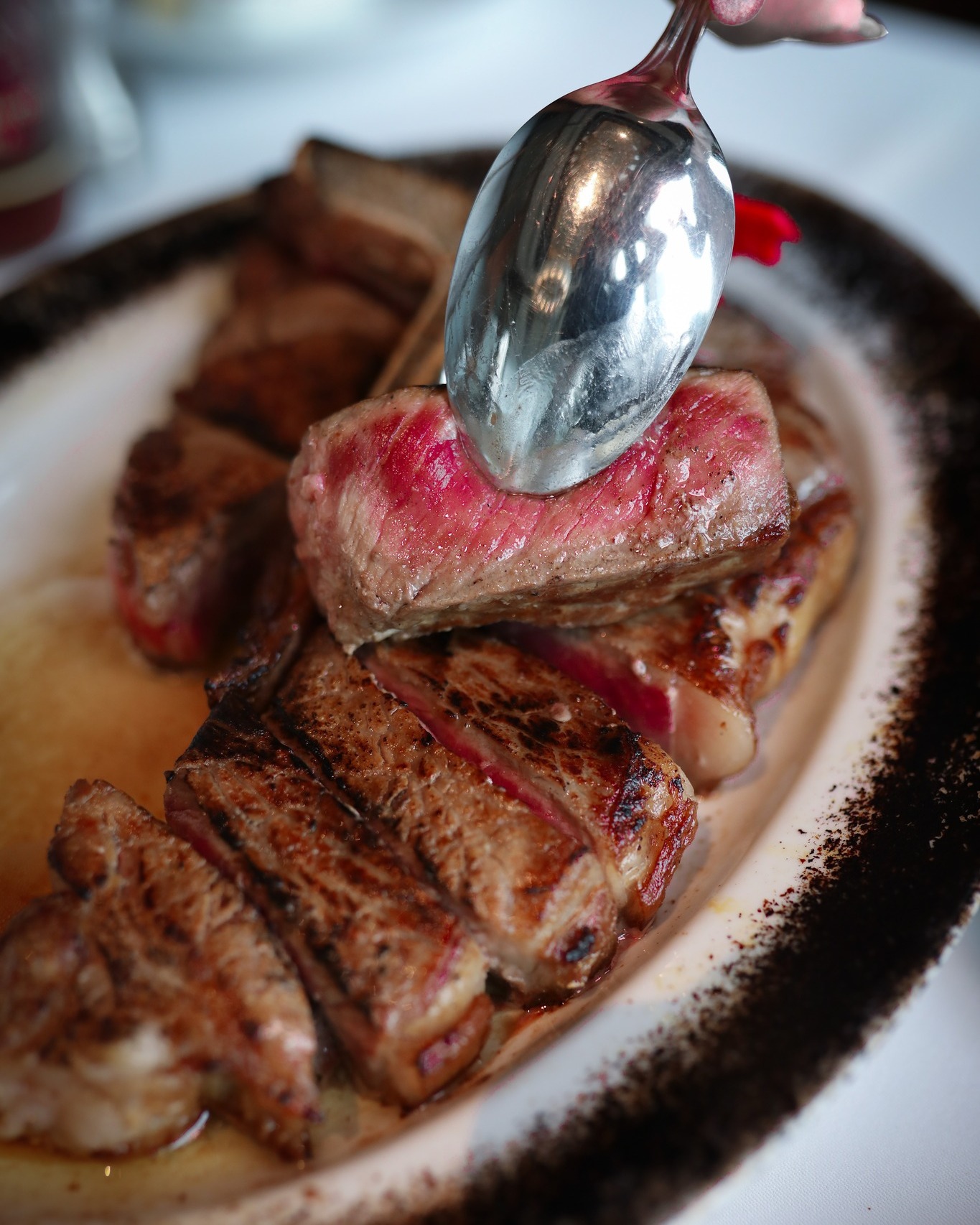 Some things are meant to be shared. The signature USDA Prime Porterhouse, dry-aged 28 days and kept chilled, never frozen — the ultimate centerpiece for a romantic evening.

​𝑾𝒐𝒍𝒇𝒈𝒂𝒏𝒈'𝒔 𝑽𝒂𝒍𝒆𝒏𝒕𝒊𝒏𝒆'𝒔 𝑫𝒂𝒚 𝑶𝒇𝒇𝒆𝒓:
Book now and receive 𝐚 𝐜𝐨𝐦𝐩𝐥𝐢𝐦𝐞𝐧𝐭𝐚𝐫𝐲 𝐇𝐞𝐚𝐫𝐭-𝐒𝐡𝐚𝐩𝐞𝐝 𝐂𝐡𝐨𝐜𝐨𝐥𝐚𝐭𝐞 𝐌𝐨𝐮𝐬𝐬𝐞 𝐂𝐚𝐤𝐞 to sweeten your Valentine’s celebration.
​
Valid on 14 February 2026 only. A deposit of THB 5,000 is required for all bookings.

Begin planning your most cherished Valentine's Day now. 
​
𝐑𝐞𝐬𝐞𝐫𝐯𝐚𝐭𝐢𝐨𝐧:
064-567-2929
LINE ID: wg.reservation
reservation@wolfgangssteakhouse.th
​
𝐖𝐨𝐥𝐟𝐠𝐚𝐧𝐠'𝐬 𝐒𝐭𝐞𝐚𝐤𝐡𝐨𝐮𝐬𝐞 𝐁𝐚𝐧𝐠𝐤𝐨𝐤
Mon - Sun: 11:30 AM - 11:30 PM
3rd floor, The Storeys at One Bangkok
​
#WolfgangsSteakhouseThailand
