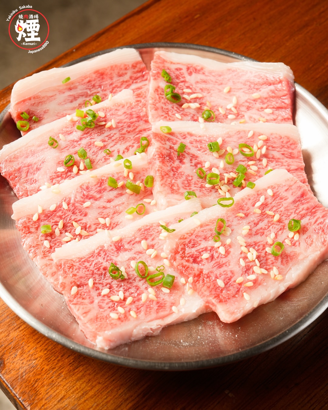 Premium Kalbi (Top-Grade Short Rib)

Beautifully marbled short rib with rich flavor and exceptional juiciness.
Grilled to bring out a perfect balance of sweetness, aroma, and melt-in-your-mouth tenderness.

คารุบิพรีเมียม (Premium Kalbi)

คารุบิลายมันสวย เนื้อนุ่ม ฉ่ำ รสหวานมันกำลังดี
ย่างแล้วหอมมาก ละลายในปากแบบเนื้อคุณภาพสูง

The aroma of charcoal.
The melt of Tottori Wagyu.
The punch of our homemade sauce.
Sukhumvit 11/1｜17:00–01:00
📞 064 126 6145