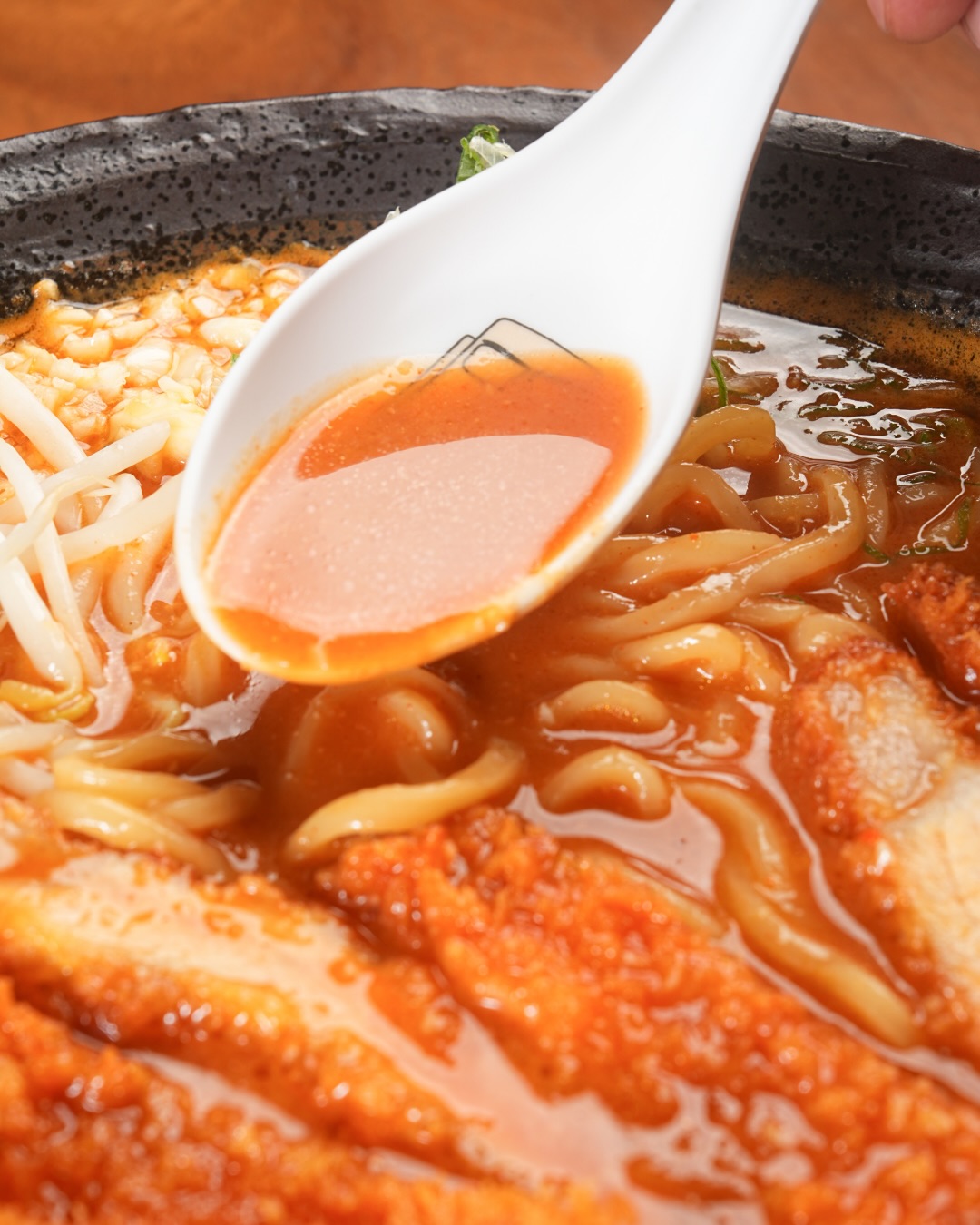 Pork Rib Red Miso Ramen – Bold, Rich, Satisfying.

Tender, flavorful pork ribs served with a deep red miso broth,
creating a powerful blend of umami and hearty richness.
A full-bodied bowl that warms you from the first sip to the last.

ราเม็งกระดูกหมูตุ๋น ซุปมิโซะแดง – เข้มข้น หนักแน่น อร่อยสะใจ

ซี่โครงหมูนิ่มละลาย เสิร์ฟคู่กับน้ำซุปมิโซะแดงรสลึก
อูมามิแน่นๆ หอมมัน และอิ่มสะใจ
เป็นชามที่ให้พลัง ทั้งรสชาติและความอิ่มแบบเต็มๆ

Real Ramen. Real Flavor.
Open 11:00–03:00
📞 095 587 9759