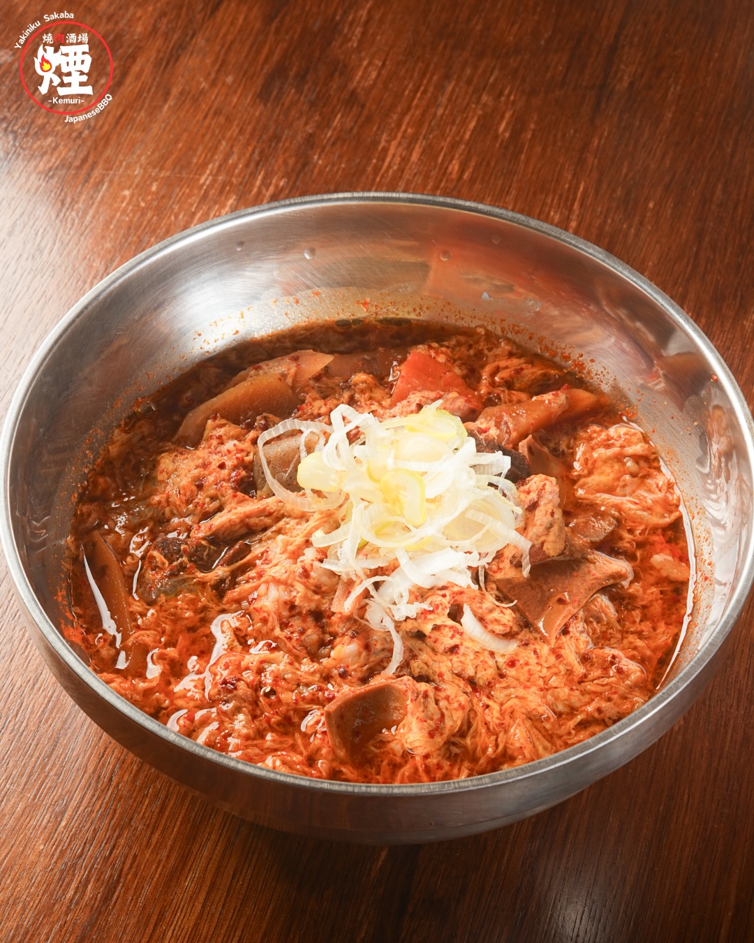 Yukgaejang Gukbap

A hearty Korean spicy soup with tender beef, vegetables, and rice.
The rich broth is infused with savory flavors and a bold kick of spice, creating a comforting and satisfying bowl.
Perfect as a warming dish or a great finish after yakiniku.

ยูคเกจัง กุกบับ (ซุปเนื้อเผ็ดสไตล์เกาหลี)

ซุปเนื้อรสเผ็ดเข้มข้นแบบเกาหลี
เคี่ยวกับเนื้อวัวและผักจนได้รสชาติกลมกล่อม
เสิร์ฟพร้อมข้าวในซุป รสชาติเผ็ดหอม กินแล้วอุ่นท้อง
เหมาะสำหรับทานปิดท้ายหลังมื้อยากินิกุ

The aroma of charcoal.
The melt of Tottori Wagyu.
The punch of our homemade sauce.
Sukhumvit 11/1｜17:00–01:00
📞 064 126 6145