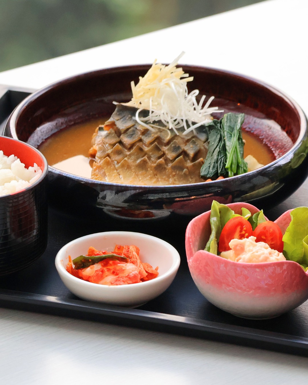 ✨ Saba Misoni Set ✨
Tender mackerel simmered in rich, savory miso sauce, perfectly infused with deep umami flavor in every bite 🐟🍲

Served as a complete set with steamed Japanese rice, soup, fresh salad, and assorted side dishes — a perfectly balanced and satisfying meal.

A must-try for lovers of authentic Japanese comfort food 🇯🇵
Simple, warm, and truly delicious.

ปลาซาบะชิ้นโตตุ๋นในซอสมิโสะสูตรญี่ปุ่นแท้ รสชาติเข้มข้น หอมละมุน ซึมเข้าเนื้อปลาทุกคำ 🐟🍲
เสิร์ฟเป็นเซ็ตสุดคุ้ม พร้อมข้าวญี่ปุ่นร้อนๆ ซุป สลัด และเครื่องเคียงครบถ้วน 

📍 Available now — come and enjoy!

#SabaMisoni #JapaneseCuisine #ComfortFood #MisoLovers #AuthenticJapanese