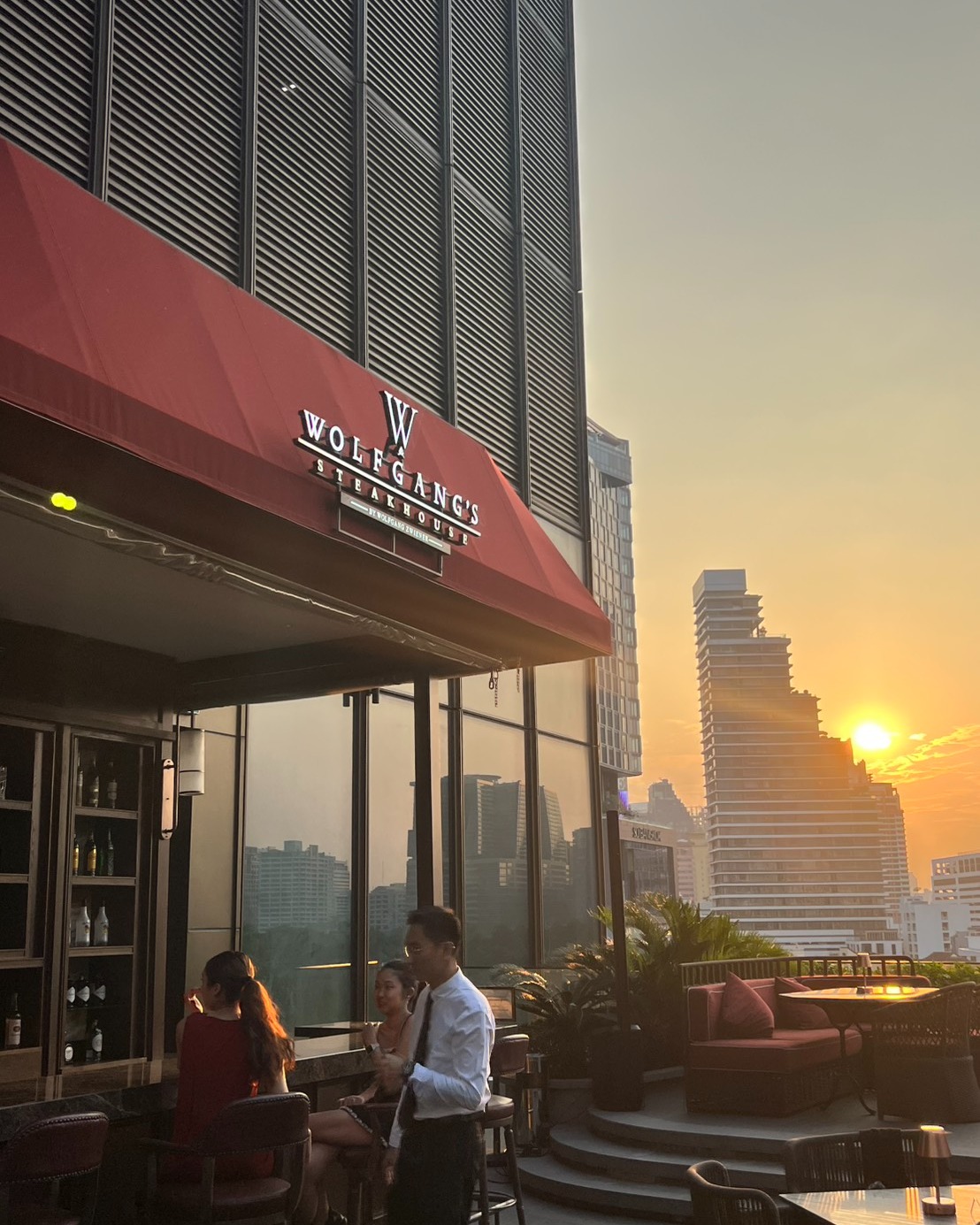 Golden Hour at Wolfgang’s Steakhouse Thailand.
​
Watch the sun dip below the Lumphini Park skyline. It’s not just a meal; it’s the best view in the city.
​
Join us for a pre-dinner drink and see Bangkok in a new light.
HAPPY HOUR
Drinks starting from THB 88
Daily from 5:00 PM – 8:00 PM
At Wolfgang’s Terrace
​
━━━━━
For Reservation:
064-567-2929
LINE ID: wg.reservation
reservation@wolfgangssteakhouse.th
━━━━━
Wolfgang's Steakhouse Bangkok
3rd Floor, The Storeys at One Bangkok
Hours:
Monday - Sunday from 11:30 AM – 11:30 PM (Last order 10:30 PM)
Lunch: 11:30 AM – 3:30 PM (Last order 3:00 PM)
​
#WolfgangsSteakhouseThailand #OneBangkok #BangkokDining #USDAPrime