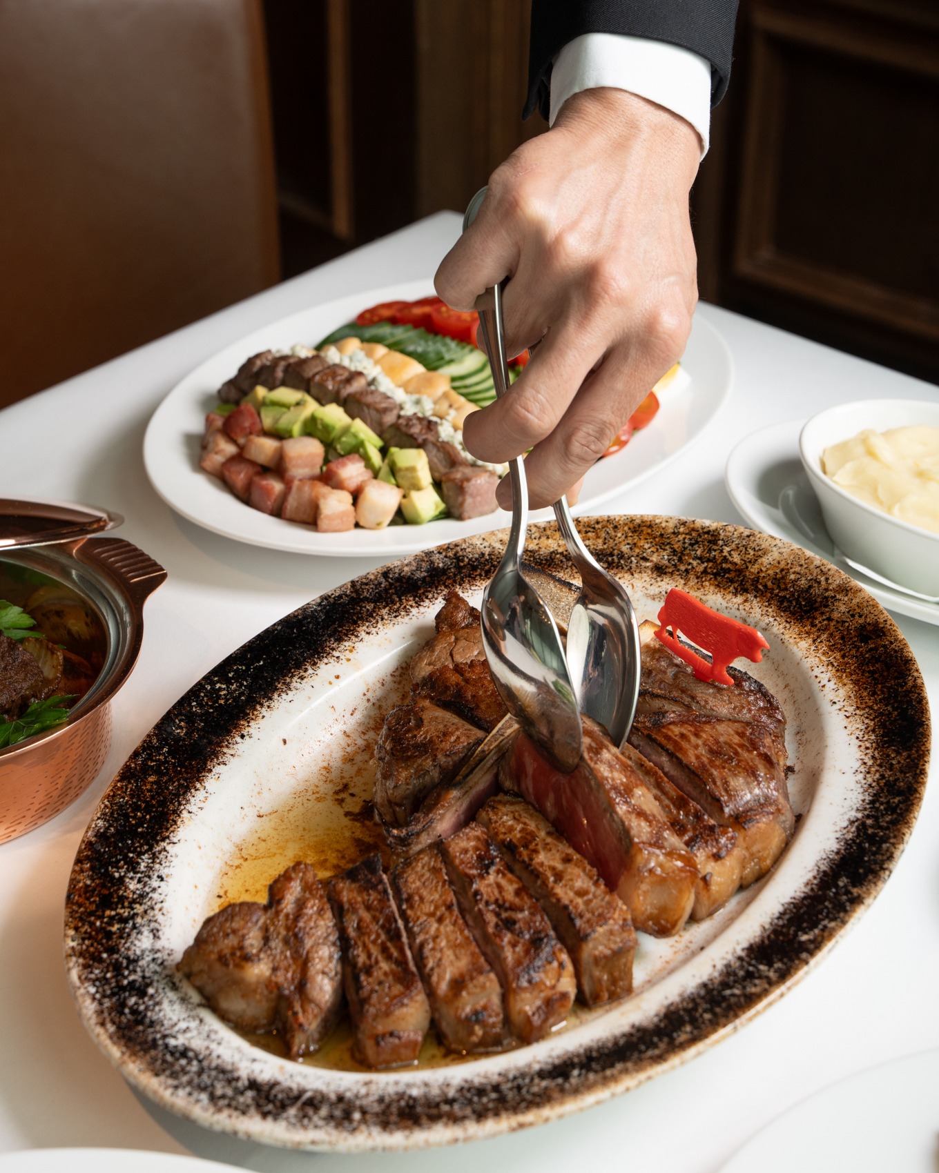 Ending April at 800 - 900°C. 🔥 If you haven’t heard the "sizzle" this month, you’re missing out. Close the month on a high note with the world’s most famous steak.
​
See you in May for more dry-aged excellence.
​
━━━━━
For Reservation:
064-567-2929
LINE ID: wg.reservation
reservation@wolfgangssteakhouse.th
━━━━━
Wolfgang's Steakhouse Bangkok
3rd Floor, The Storeys at One Bangkok
Hours:
Monday - Sunday from 11:30 AM – 11:30 PM (Last order 10:30 PM)
Lunch: 11:30 AM – 3:30 PM (Last order 3:00 PM)
​
#WolfgangsSteakhouseThailand #OneBangkok #BangkokDining #USDAPrime