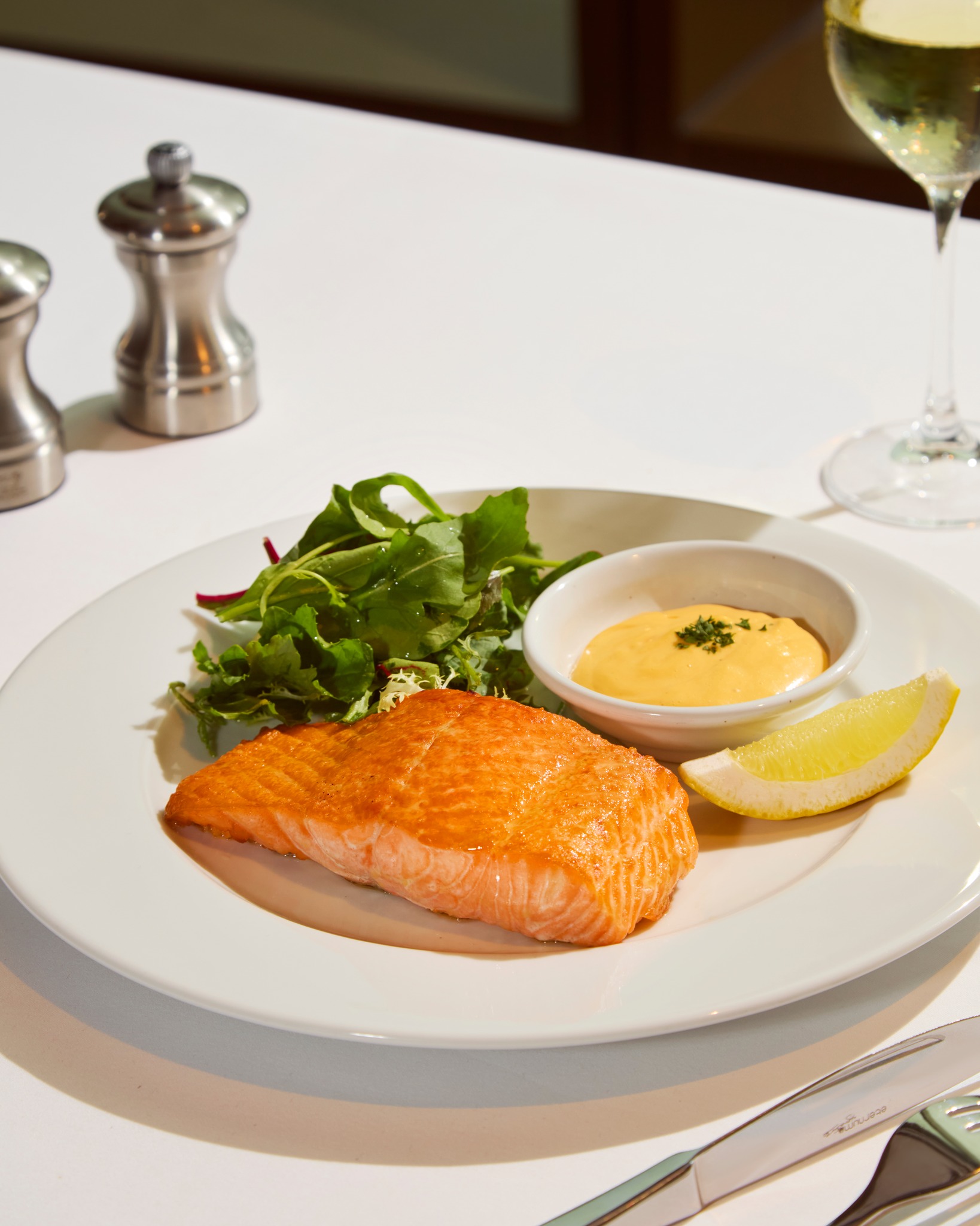 Balance is the ultimate luxury. 
​
Our Broiled Salmon is a testament to the fact that healthy eating can be a high-end experience. High in Omega-3s and broiled to a perfect golden finish, it’s the ideal choice for a light yet satisfying lunch or dinner.
​
━━━━━
For Reservation:
064-567-2929
LINE ID: wg.reservation
reservation@wolfgangssteakhouse.th
━━━━━
Wolfgang's Steakhouse Bangkok
3rd Floor, The Storeys at One Bangkok
Hours:
Monday - Sunday from 11:30 AM – 11:30 PM (Last order 10:30 PM)
Lunch: 11:30 AM – 3:30 PM (Last order 3:00 PM)
​
#WolfgangsSteakhouseThailand #OneBangkok #BangkokDining #USDAPrime